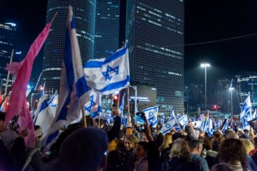 TEL AVIV, ISRAEL - January 21, 2023: Israelis protest in Tel Aviv against plans by prime minister Benjamin Netanyahu new government to trample the legal system and the supreme court